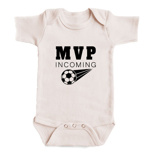 A baby onesie with the text "MVP INCOMING" printed on it, along with a soccer ball graphic.