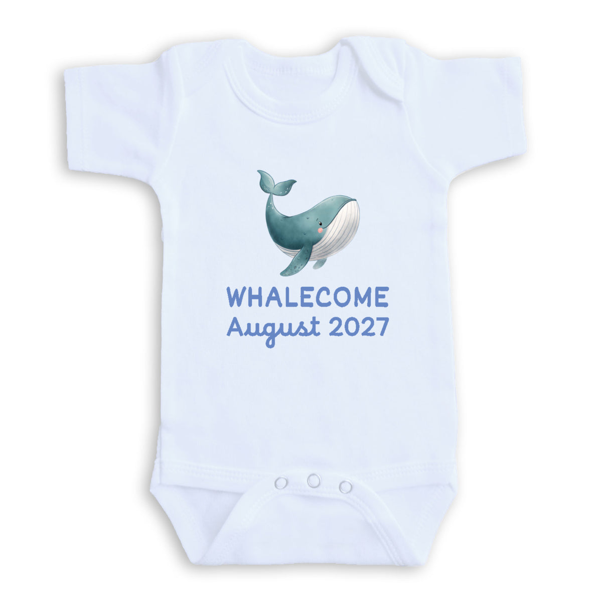 A white baby onesie with a graphic of a whale and the text "Whalecome August 2027" printed on it.