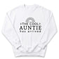 A white sweatshirt with the text "THE COOL AUNTIE has arrived" printed on it.