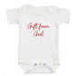 A white colored baby bodysuit with "gift from god" embroidered on the front in red thread