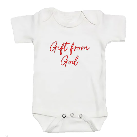 A white colored baby bodysuit with "gift from god" embroidered on the front in red thread