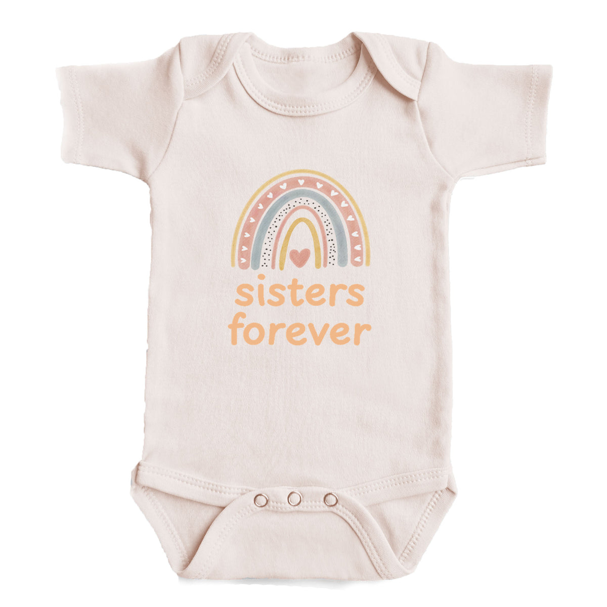 A baby onesie with a rainbow graphic and the text "sisters forever" printed on it.