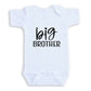A white baby onesie with the text "BIG BROTHER" printed on it.