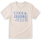 A beige t-shirt with the text "COOL GRANDMAS CLUB" printed on it in blue letters.
