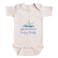 A baby onesie with a sailboat graphic and the text "GRANDPA'S Sailing Buddy" printed on it.