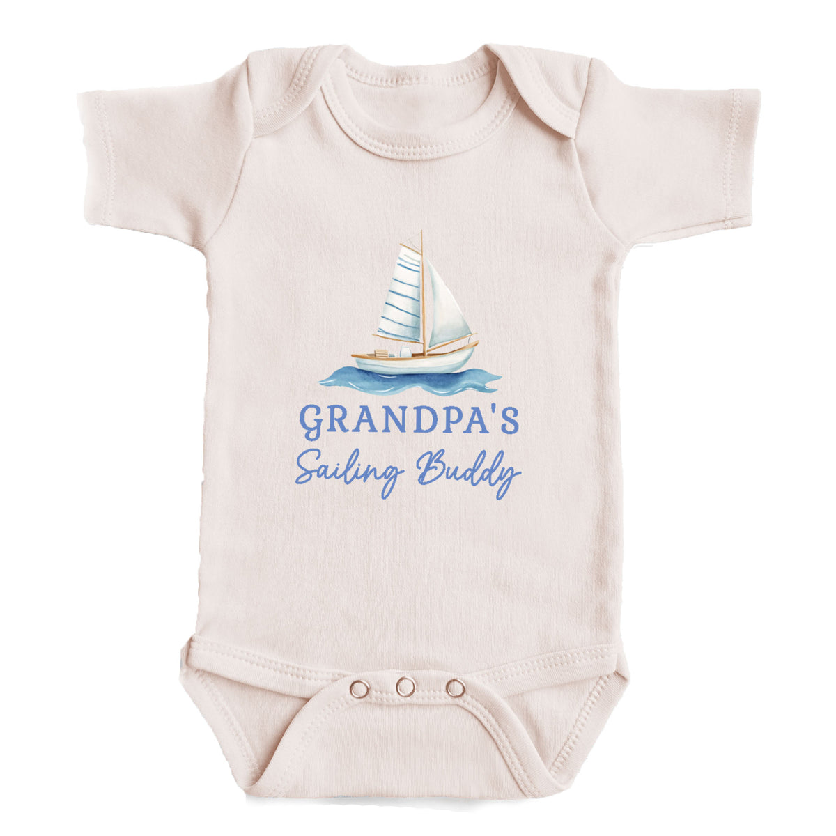 A baby onesie with a sailboat graphic and the text "GRANDPA'S Sailing Buddy" printed on it.