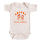 A baby onesie with a crab design and the text "CRABBY little sister" printed on it.