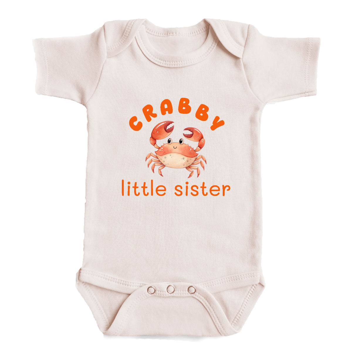 A baby onesie with a crab design and the text "CRABBY little sister" printed on it.