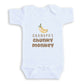A white baby onesie with a printed design of bananas and the text "GRANDPA'S CHUNKY MONKEY" printed on it.
