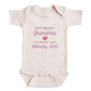 a baby onesie with text printed on it.