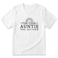 A white t-shirt with a graphic design that says "THE COOL AUNTIE has arrived" along with a sun-like symbol.