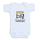 A white baby onesie with a printed message that reads "Promoted to big brother".