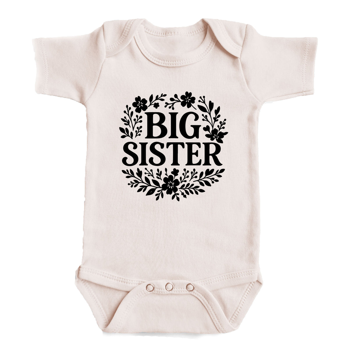 A baby onesie with the text "BIG SISTER" printed on it.