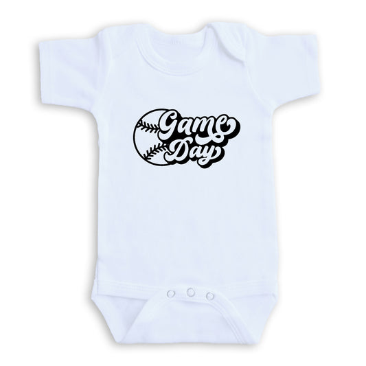 A white baby onesie with the text "Game Day" printed on it.