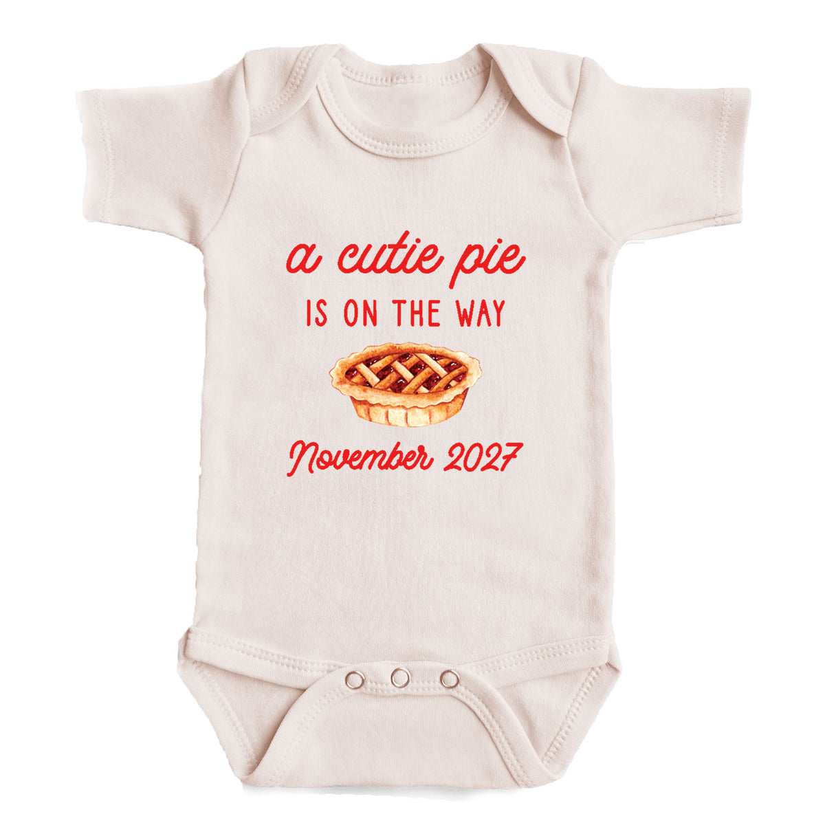 A baby onesie with a printed message on it.