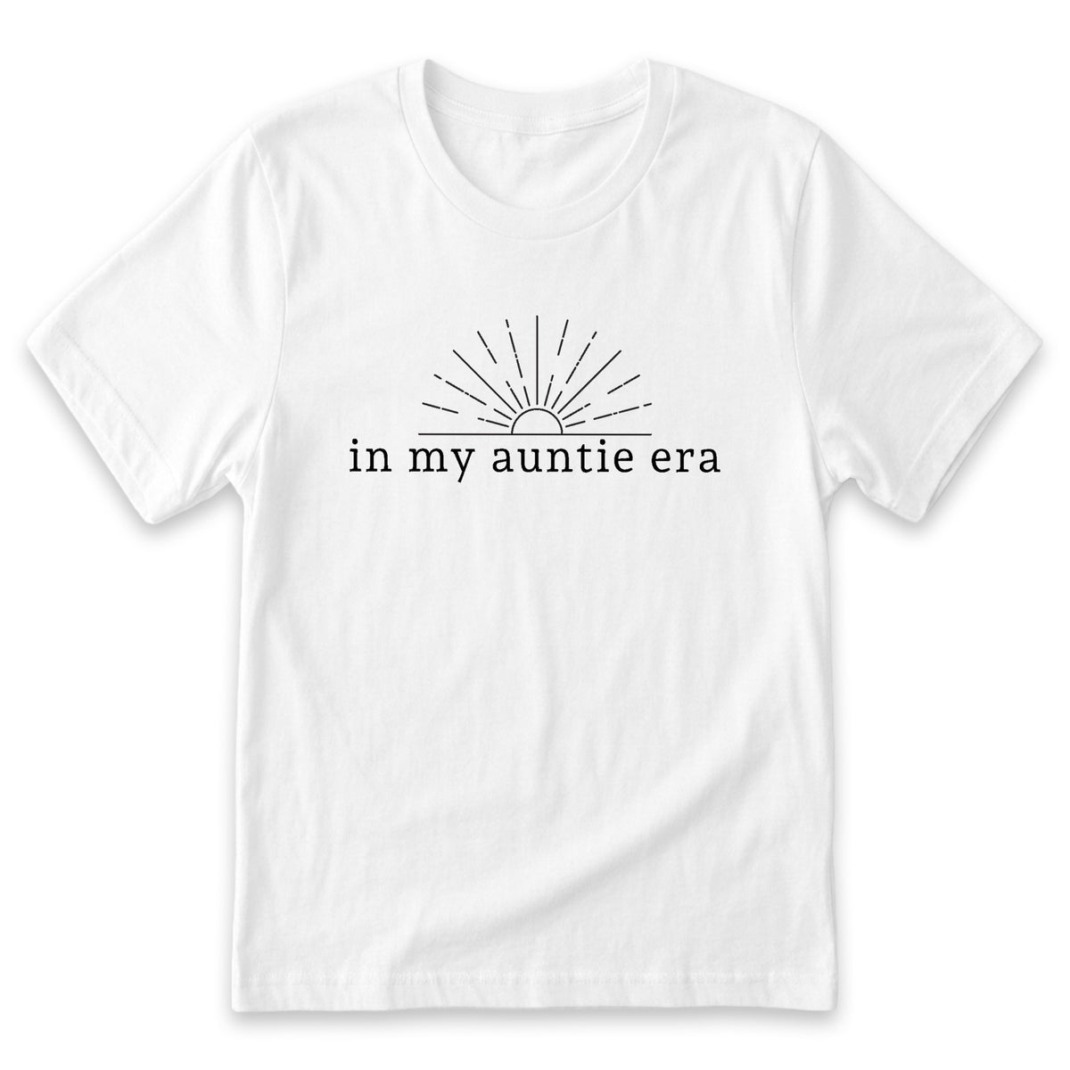 A white t-shirt with a graphic design featuring a sun with rays emanating from it, accompanied by the text "in my auntie era" printed on it.