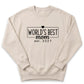 A beige sweatshirt with the text "WORLD'S BEST mom est. 2027" printed on it.