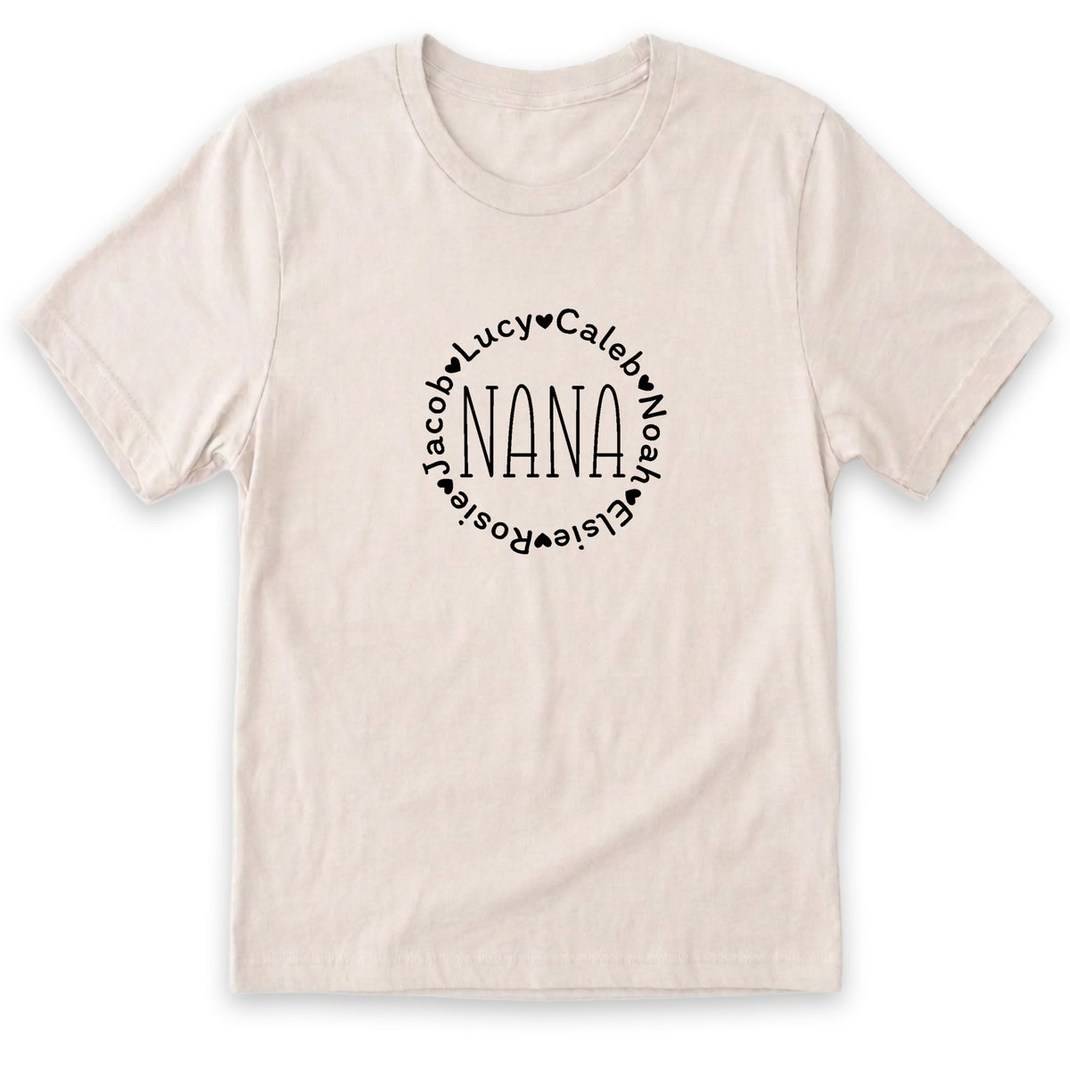 A beige t-shirt with a circular design featuring the word "NANA" surrounded by the names "Jacob, Lucy, Caleb, Noah, Grace, and Grace" in a stylized font.