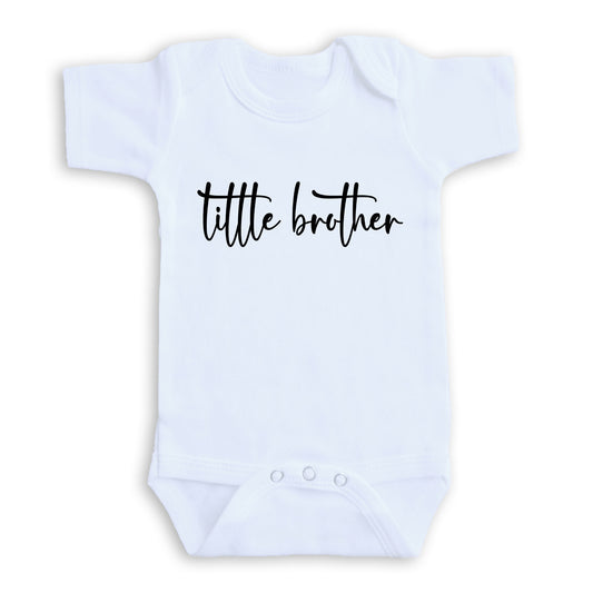 A white baby onesie with the text "title brother" printed on it.
