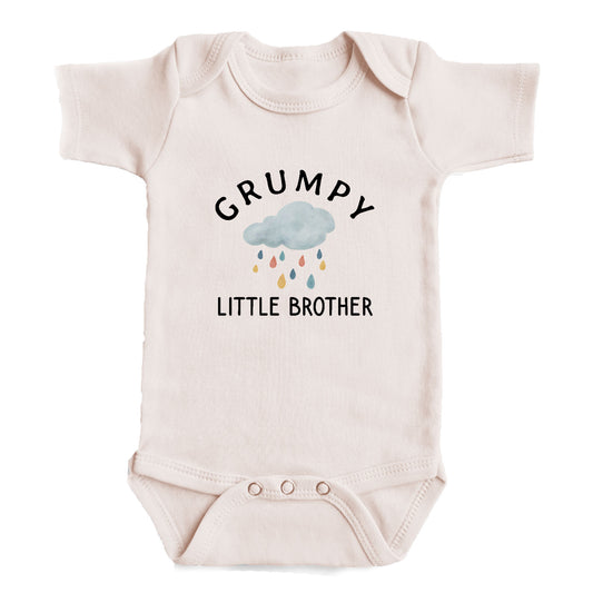 A baby onesie with the text "GRUMPY LITTLE BROTHER" printed on it.