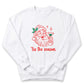 A white sweatshirt with a graphic design depicting a smiling Santa Claus holding a martini glass and the text "Tis the season" below the image.