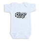 A white baby onesie with the text "Game Day" printed on it.