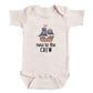 A baby onesie with a printed image of a pirate ship and the text "new to the crew" printed on it.