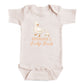 A baby onesie with a cartoon image of a duck and the text "GRANDMA'S LUCKY DUCK" printed on it.