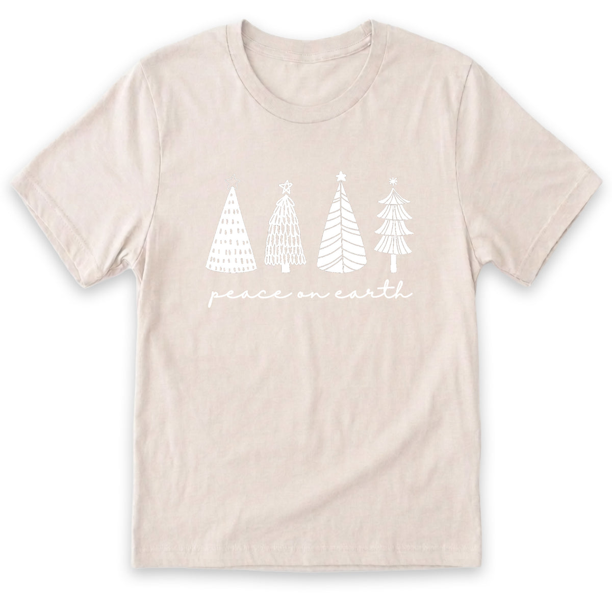 A beige t-shirt with a graphic design featuring four stylized Christmas trees and the text "Peace on earth" printed on it.