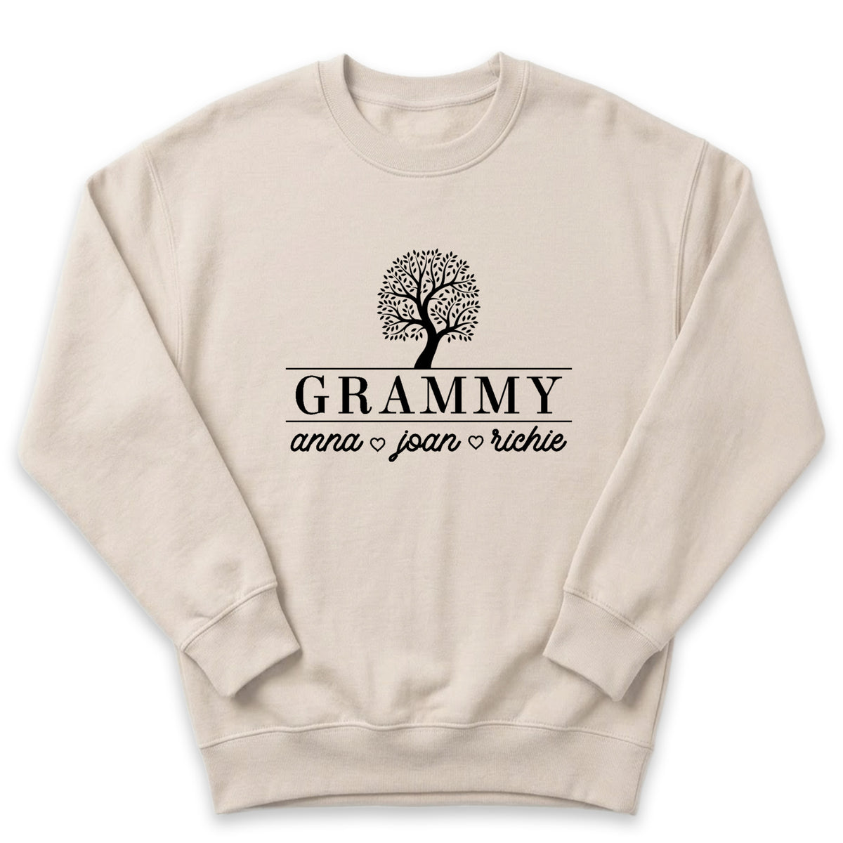 A beige sweater with a graphic design and text printed on it.