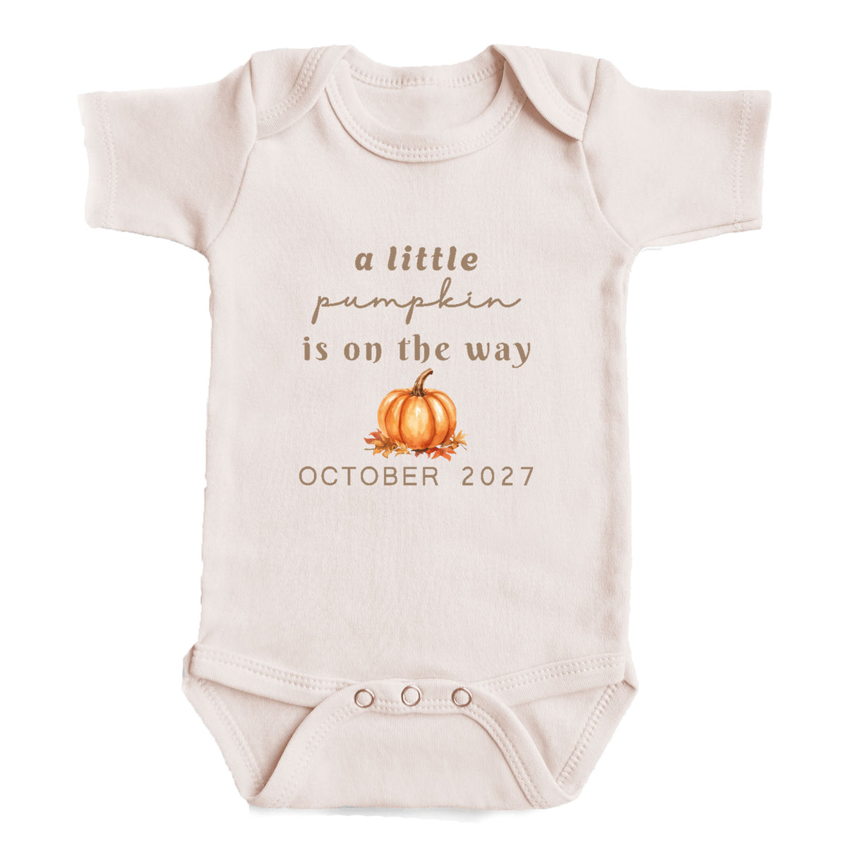 A baby onesie with the text "a little pumpkin is on the way" and an illustration of a pumpkin.