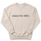 A beige sweatshirt with the text "aunt for life" printed on it.