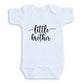 A white baby onesie with the text "little brother" printed on it.