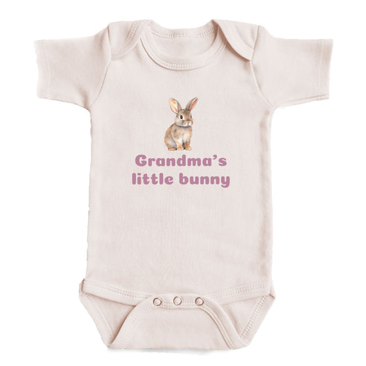 A baby onesie with a bunny image and the text "Grandma's little bunny" printed on it.