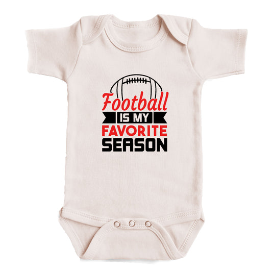 A white baby onesie with a printed text that says "Football is my favorite season" in black and red lettering.